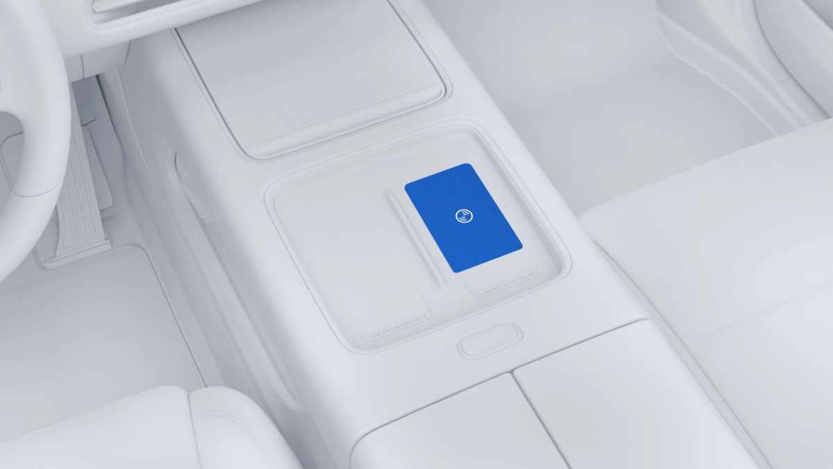 По истечении 2 минут поместите NFC-карту-ключ в зону беспроводной зарядки для переднего пассажира (как можно ближе к указанному на схеме…